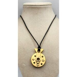 Industrial-Inspired Gold Tone Pendant Necklace With Black Cord
